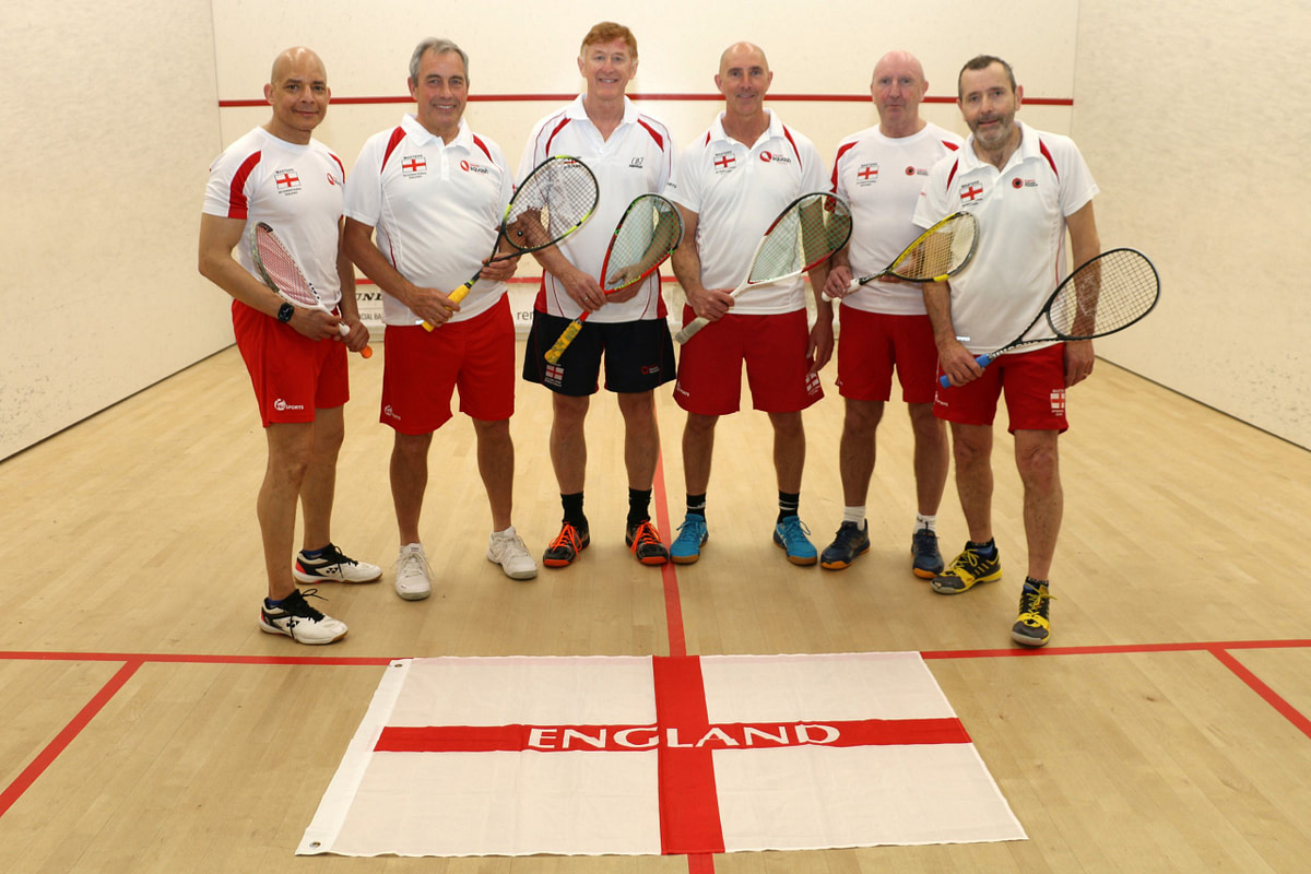 Teejay Sogunro competing at international Over-60s Masters Squash level — England representative, world ranked top 32 in 2024. The same principles he uses in competitive sport are applied to every client's sports injury rehabilitation at The Sogunro Practice, London Colney, St Albans.